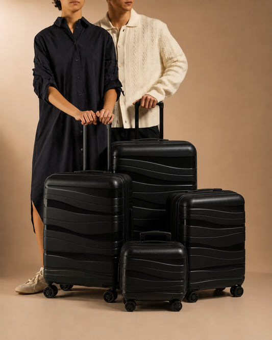 Rannoch 4 piece hard shell suitcase set lifestyle image in black