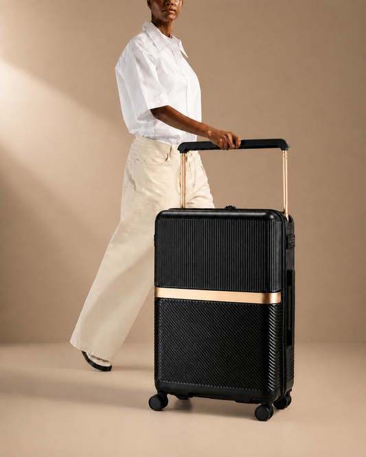 Cadgwith Cabin Suitcase in Black - lifestyle studio product photo