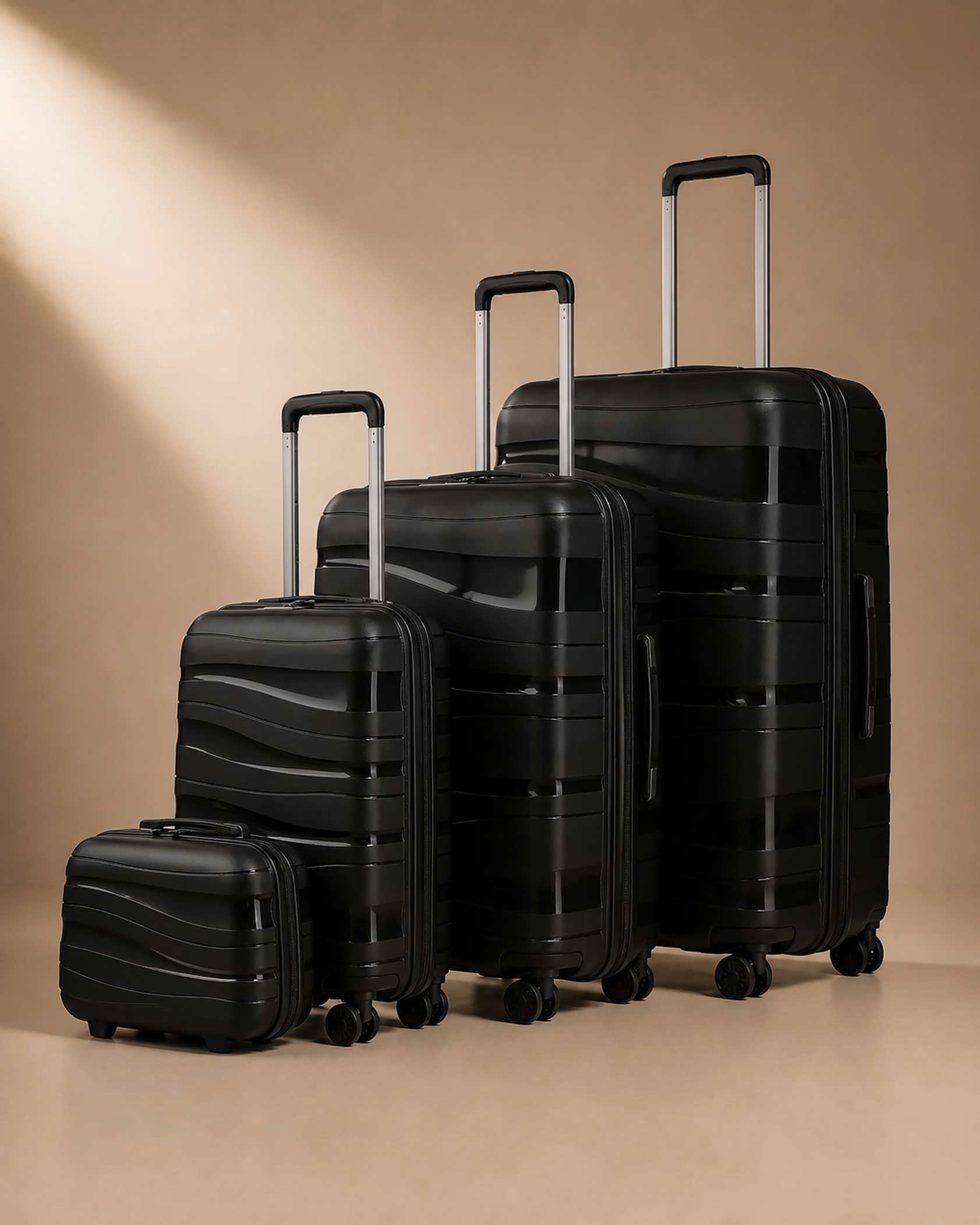 Rannoch 4 piece hard shell suitcase set in black