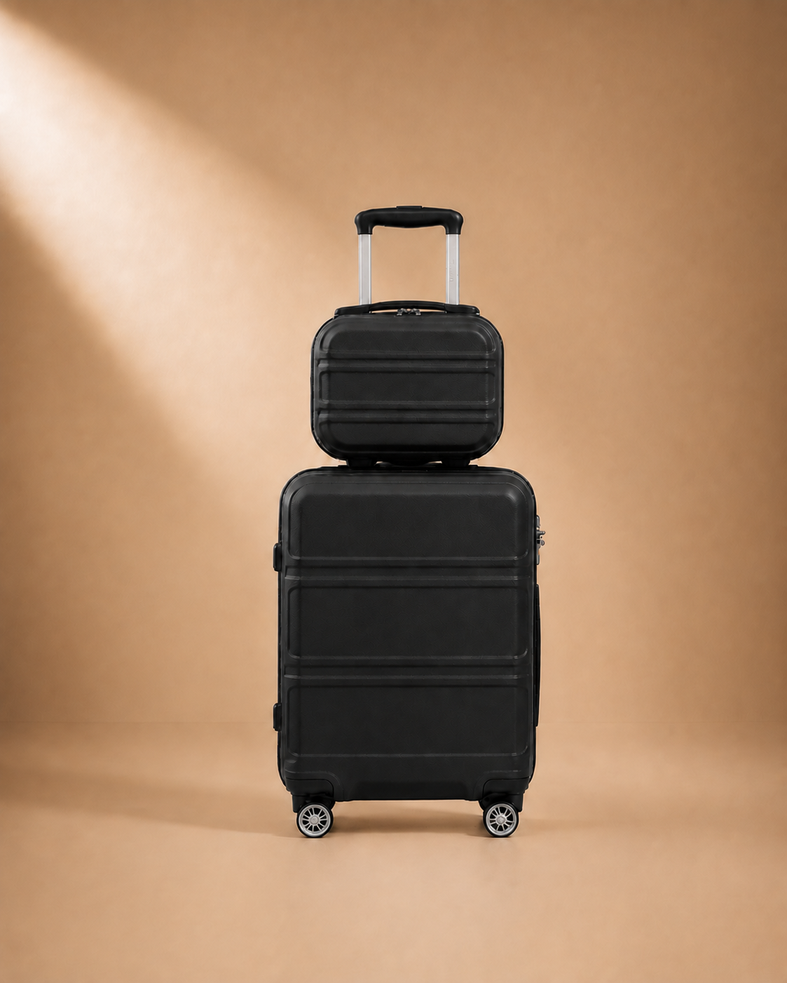 Tenby black two-piece suitcase set — premium studio product view