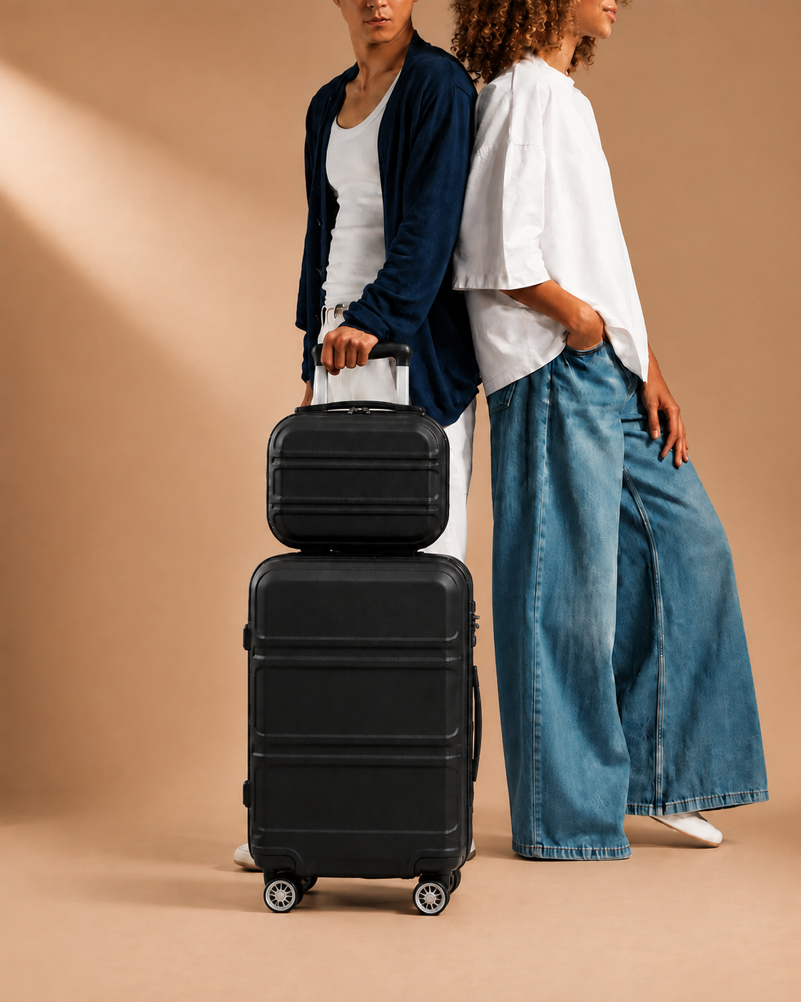 Tenby black two-piece suitcase set — premium lifestyle studio scene
