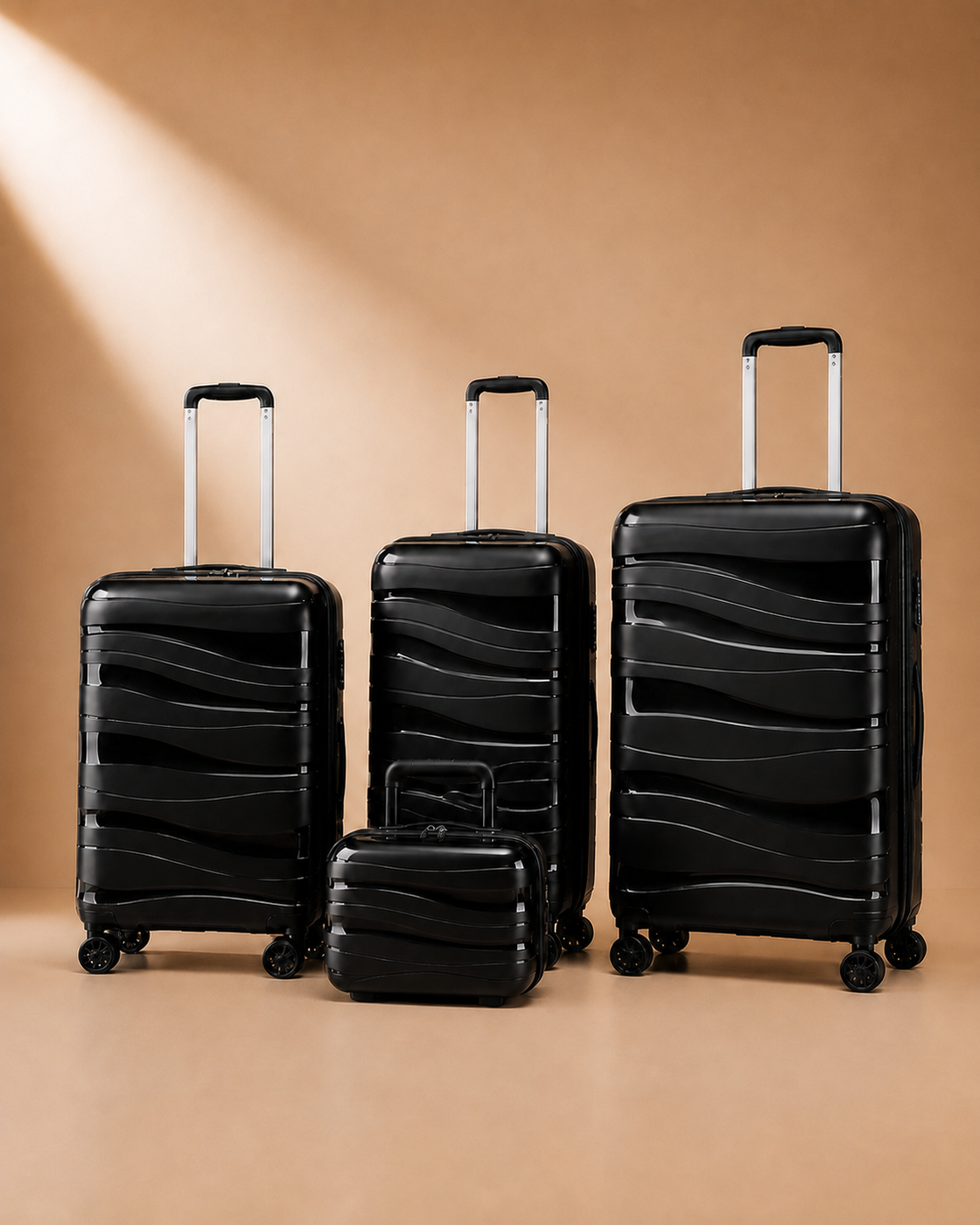 Rhosneigr 4 Piece Hard Shell Suitcase Set - black set view 2. Premium studio product photography with clean continuous background and polished hard shell suitcase finish.