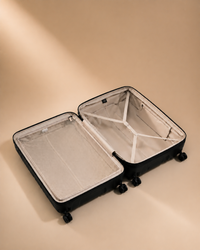 Lulworth Hard Shell Trolley Cabin Suitcase - 20 Inch - Open interior clean premium studio image. Smooth background, polished suitcase finish, high-end travel product photography.