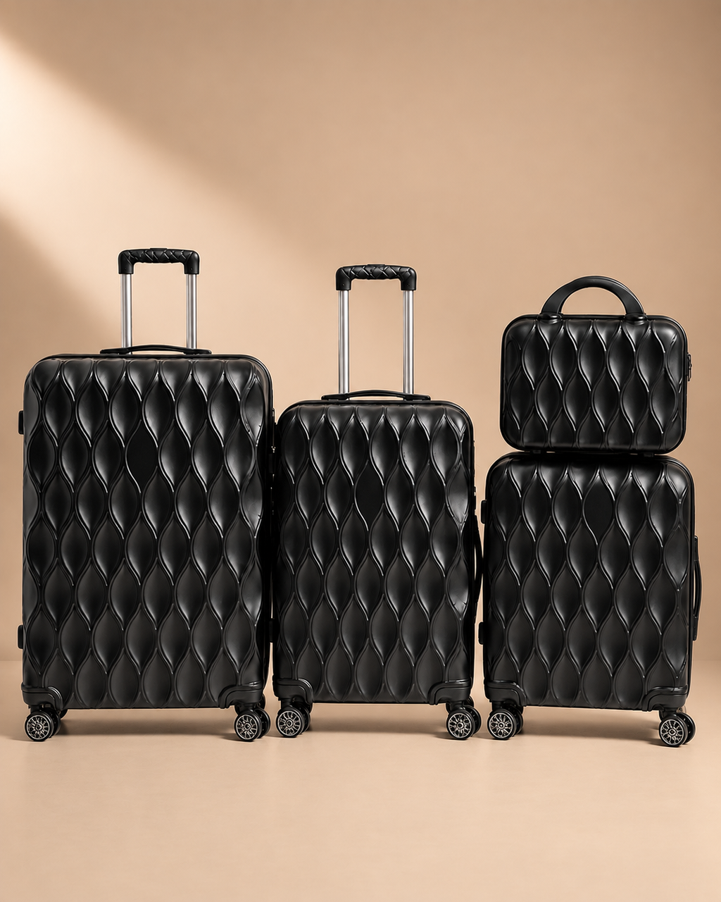 Anstruther black 4 piece suitcase set with quilted hard shell, telescopic handles and matching travel bag