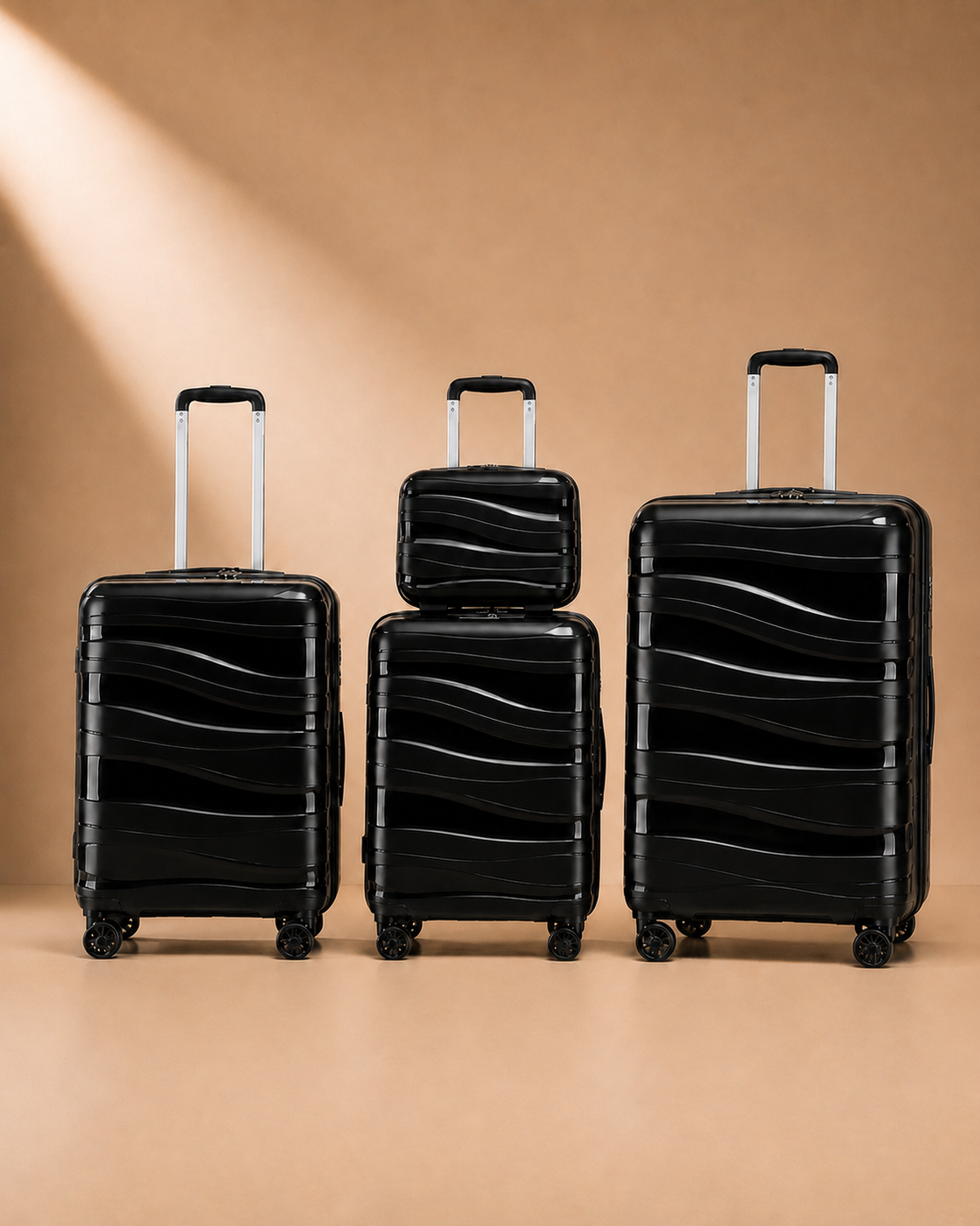 Rhosneigr 4 Piece Hard Shell Suitcase Set - black set view 3. Premium studio product photography with clean continuous background and polished hard shell suitcase finish.