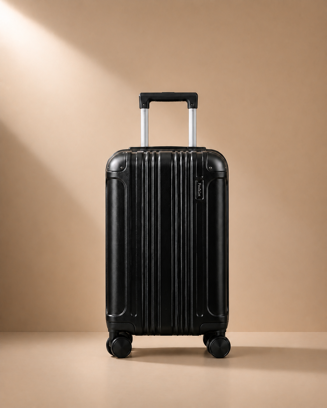 Warkworth black lightweight cabin suitcase rear view with pull handle and hard shell design