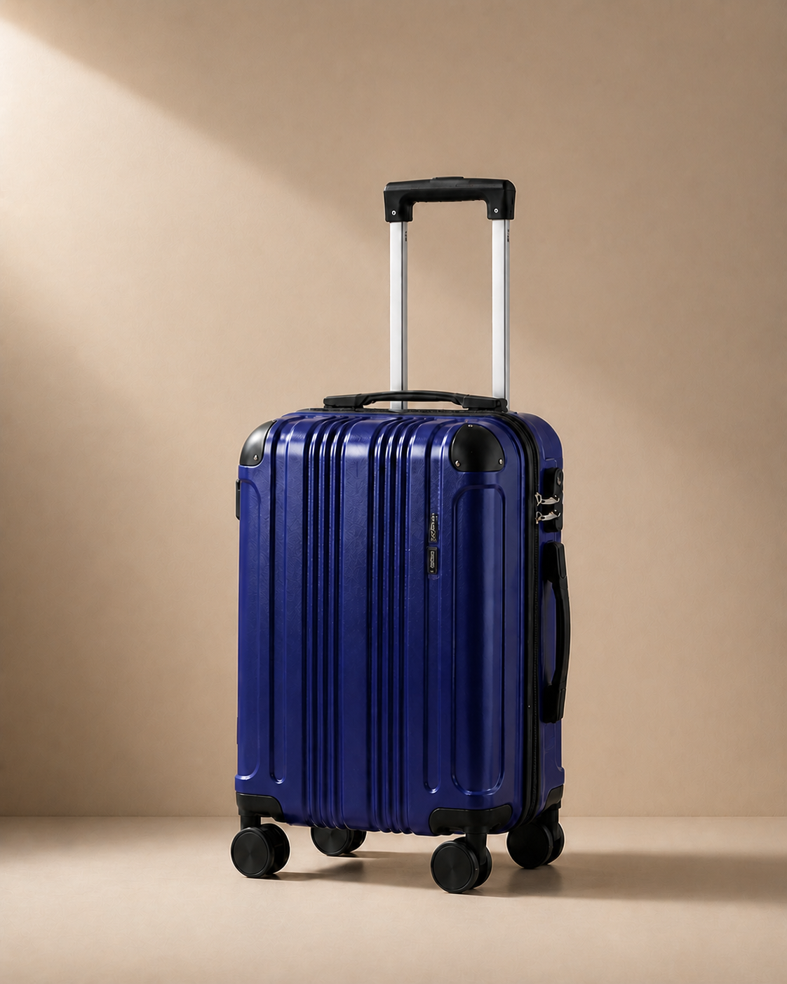 Warkworth blue lightweight 20 inch cabin suitcase with hard shell and smooth spinner wheels