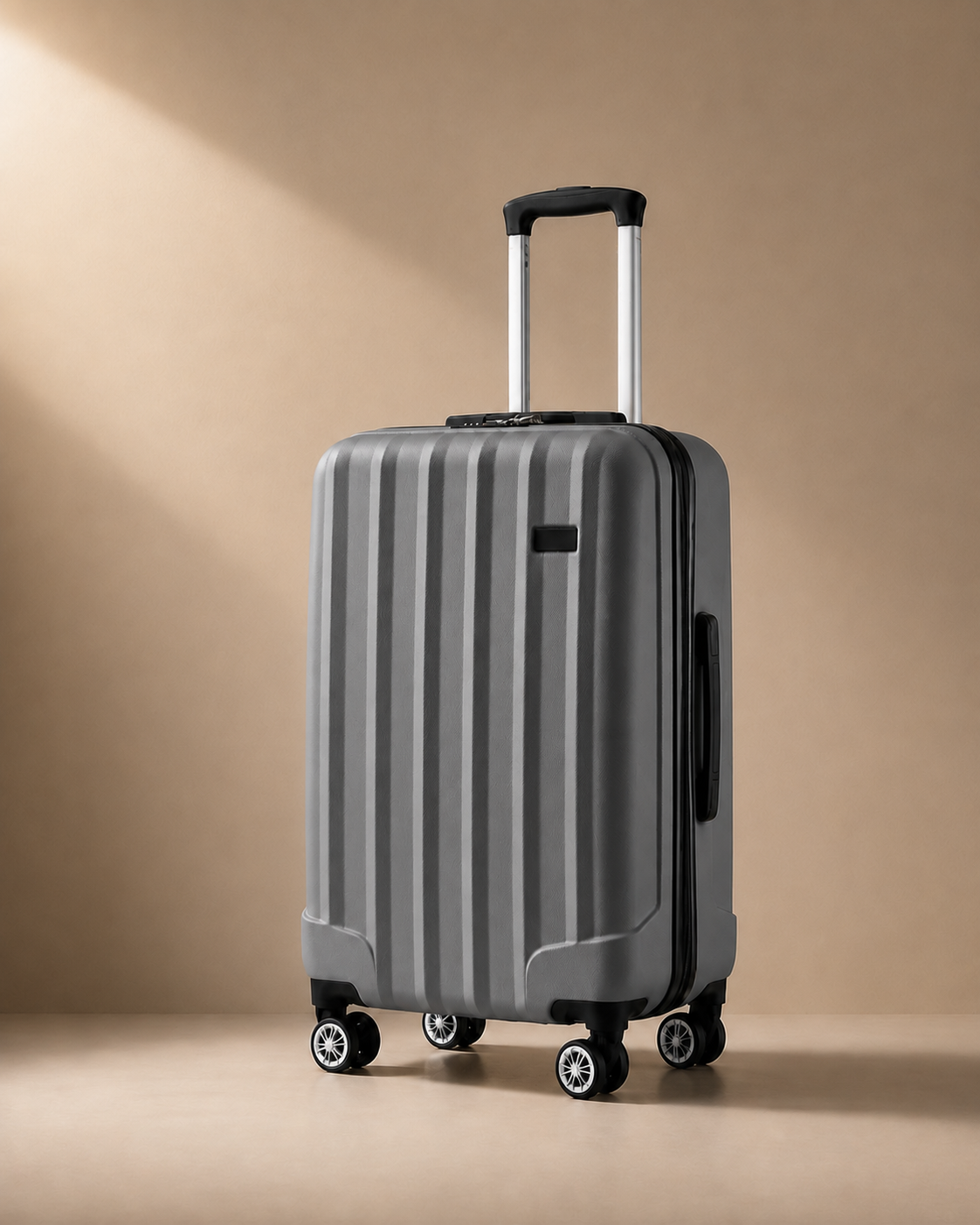 Exmouth hard shell cabin suitcase in grey, premium studio product view
