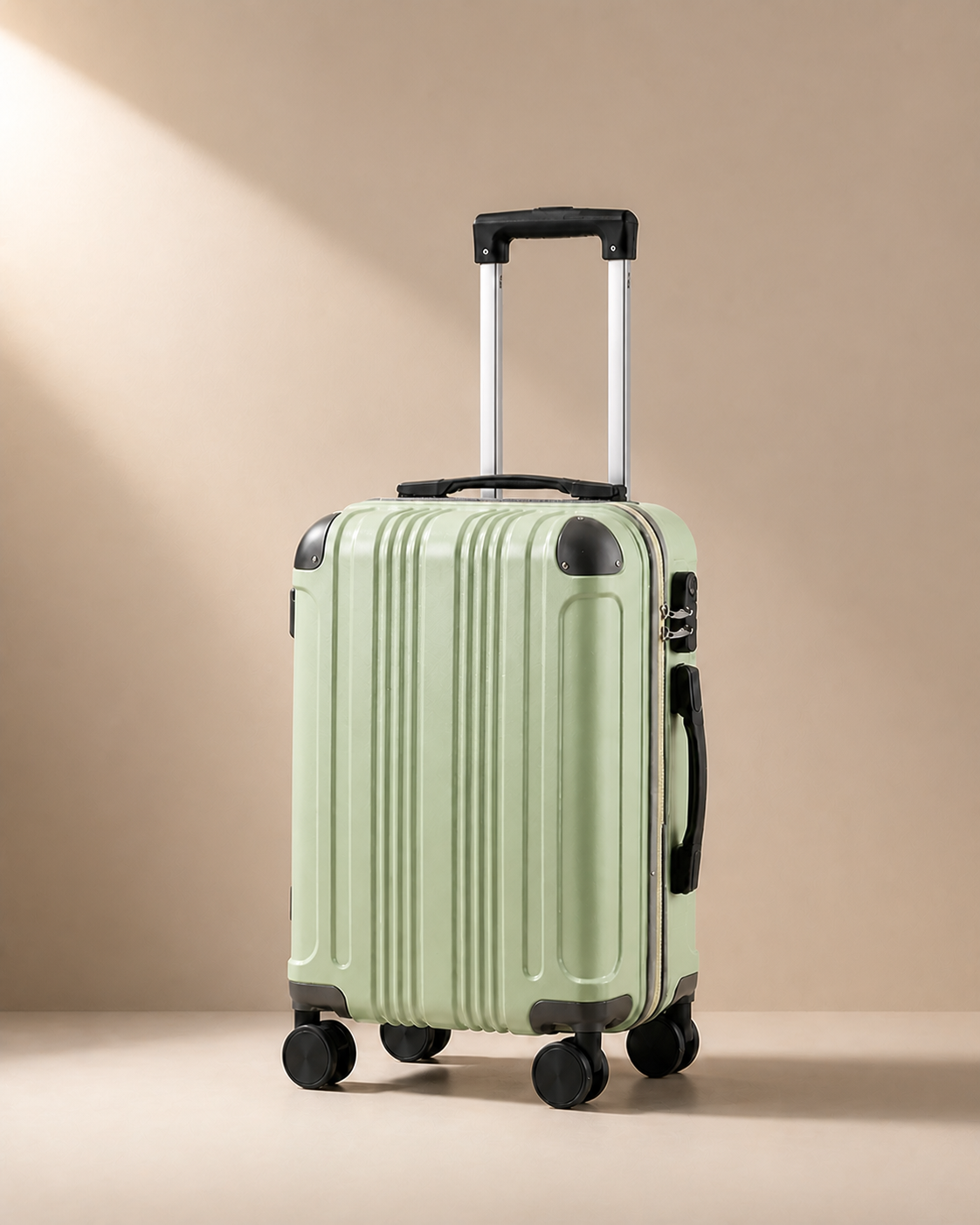 Warkworth green lightweight 20 inch cabin suitcase with hard shell and smooth spinner wheels