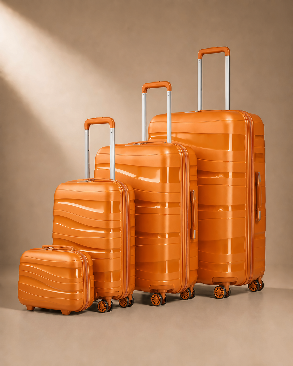 Rannoch 4 piece hard shell suitcase set in orange