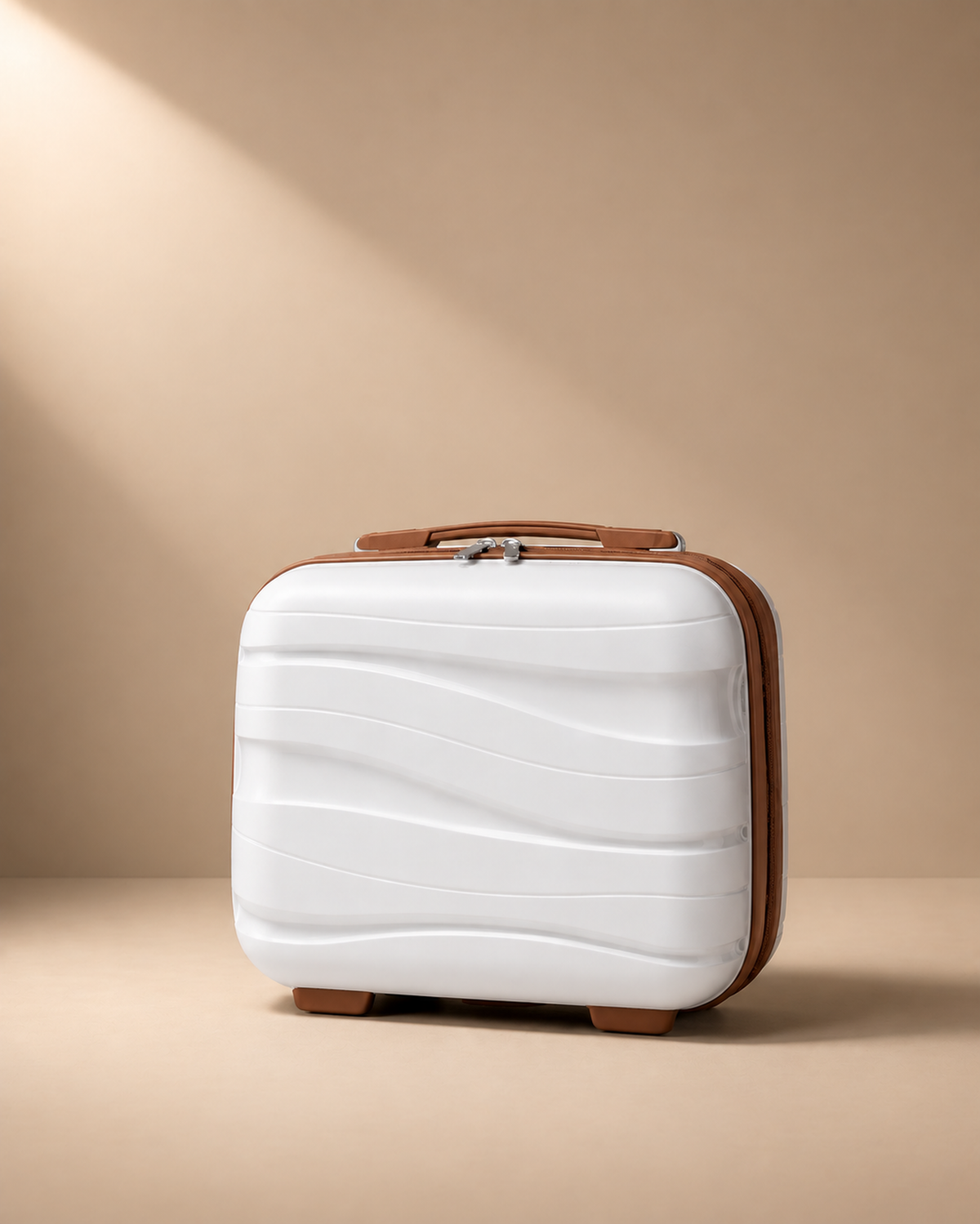Housel white hard shell travel makeup case with brown trim and wave front design in a clean studio setting.