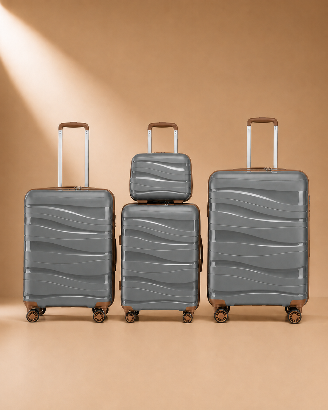 Rhosneigr 4 Piece Hard Shell Suitcase Set - Grey colour variant. Premium studio product photography with clean continuous background and polished hard shell suitcase finish.