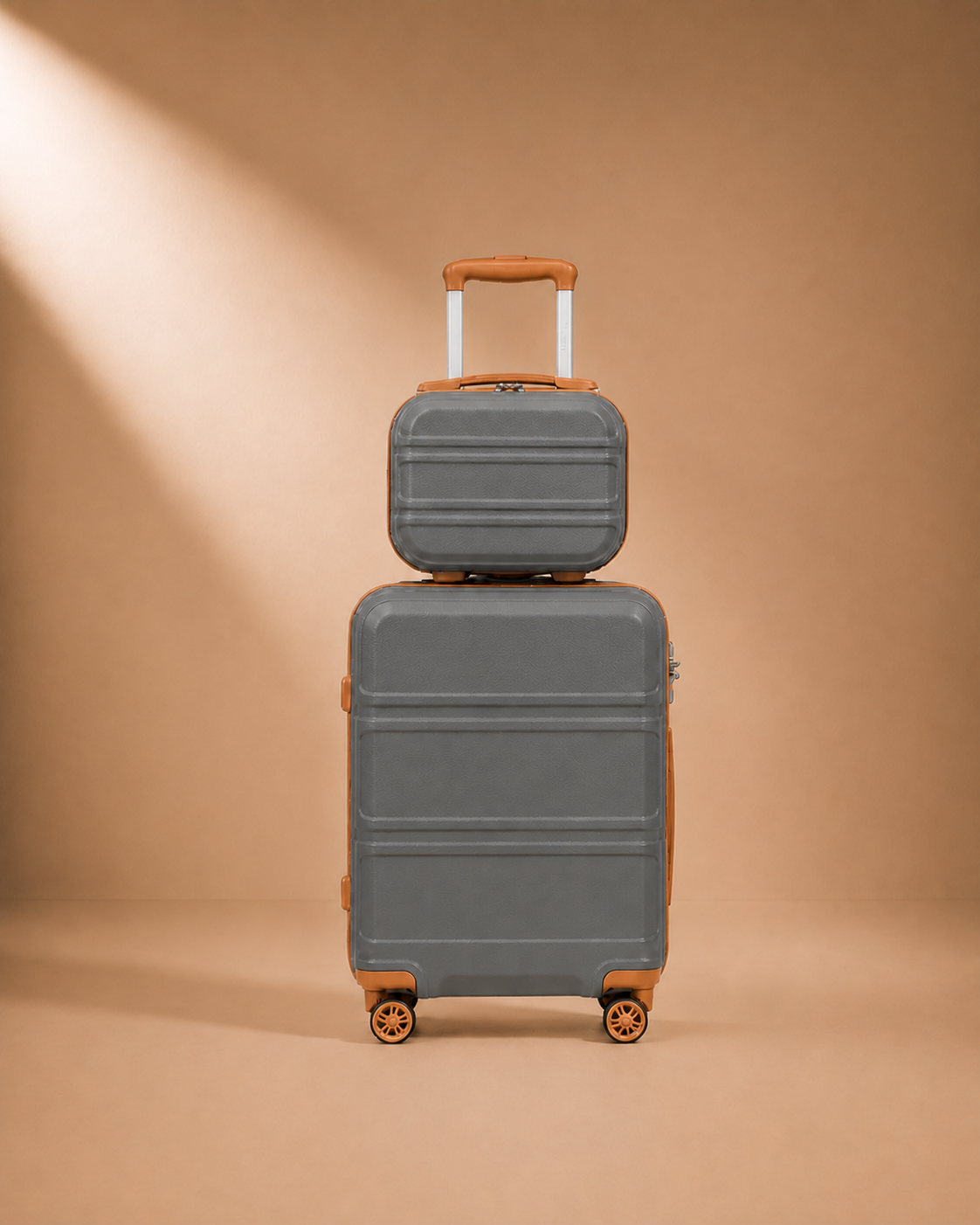 Tenby grey and brown two-piece suitcase set — premium studio product view