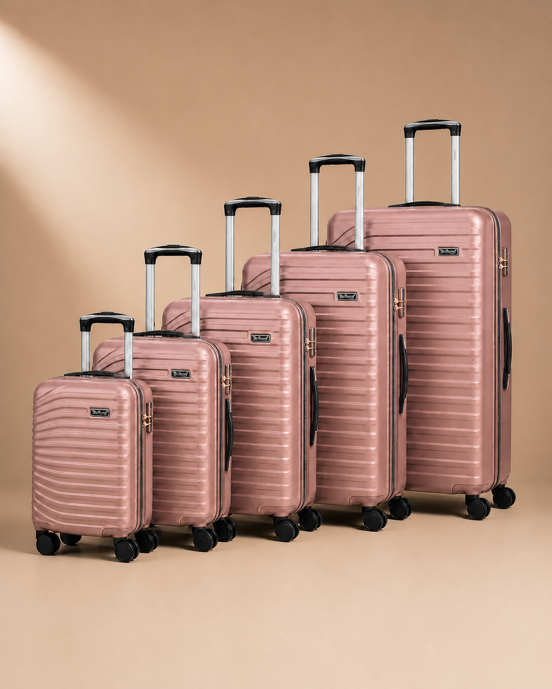 Portree 5 Piece Hard Shell Suitcase Set - 18/20/26/29/32 Inch in Rose Gold - premium cleaned studio product photo