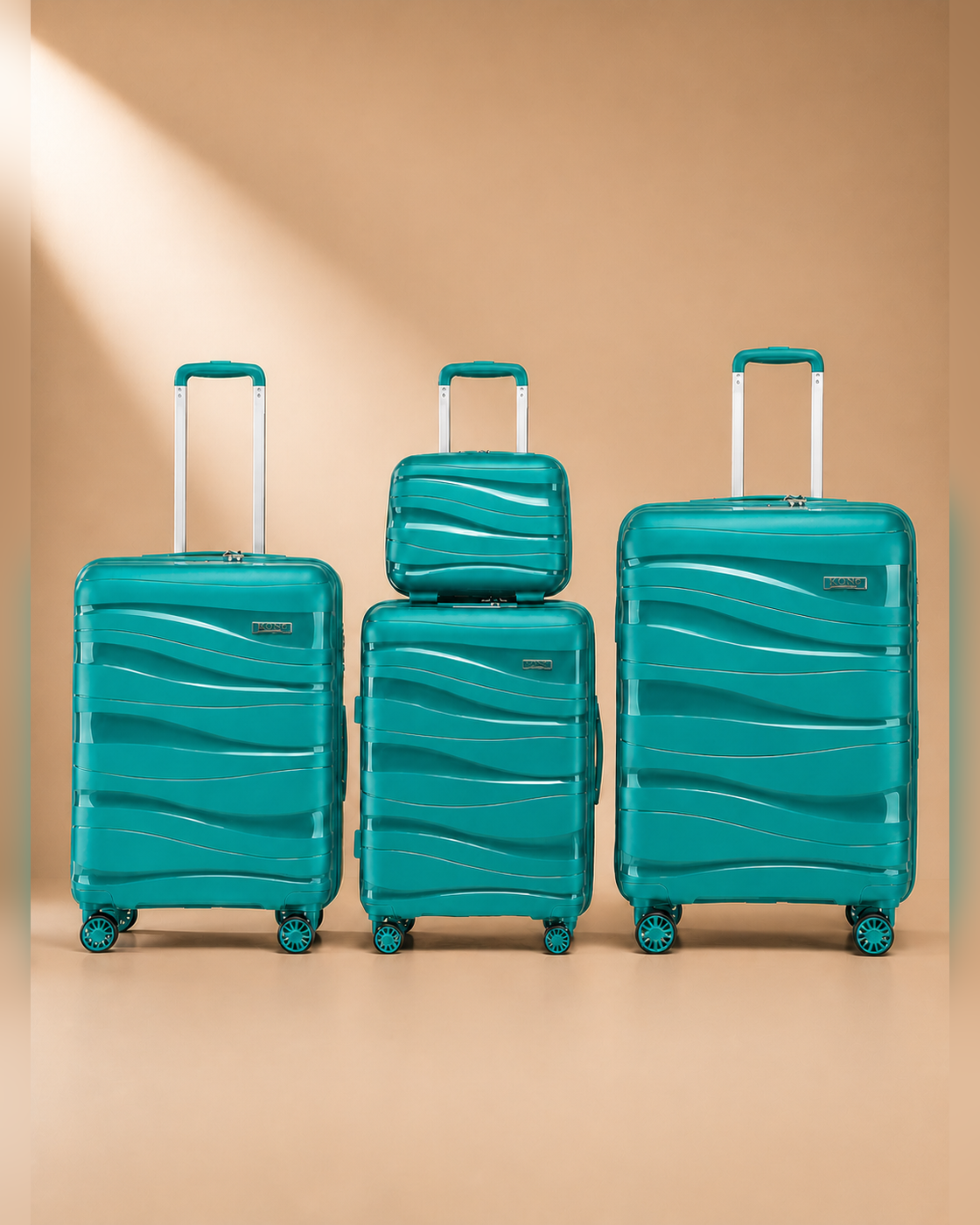 Rhosneigr 4 Piece Hard Shell Suitcase Set - Green colour variant. Clean premium studio product photography with smooth background and polished hard shell suitcase finish.