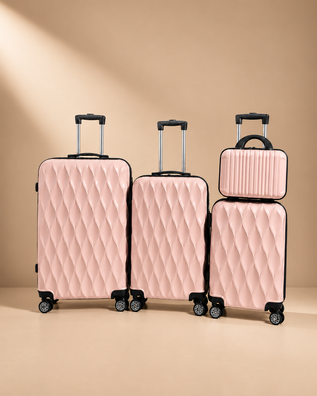 Anstruther blush pink 4 piece hard shell suitcase set with matching travel bag and glossy quilted finish