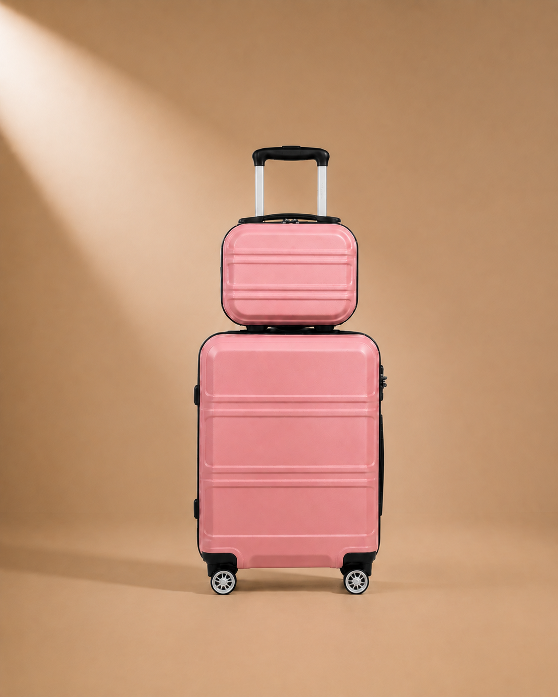 Tenby pink two-piece suitcase set — premium studio product view