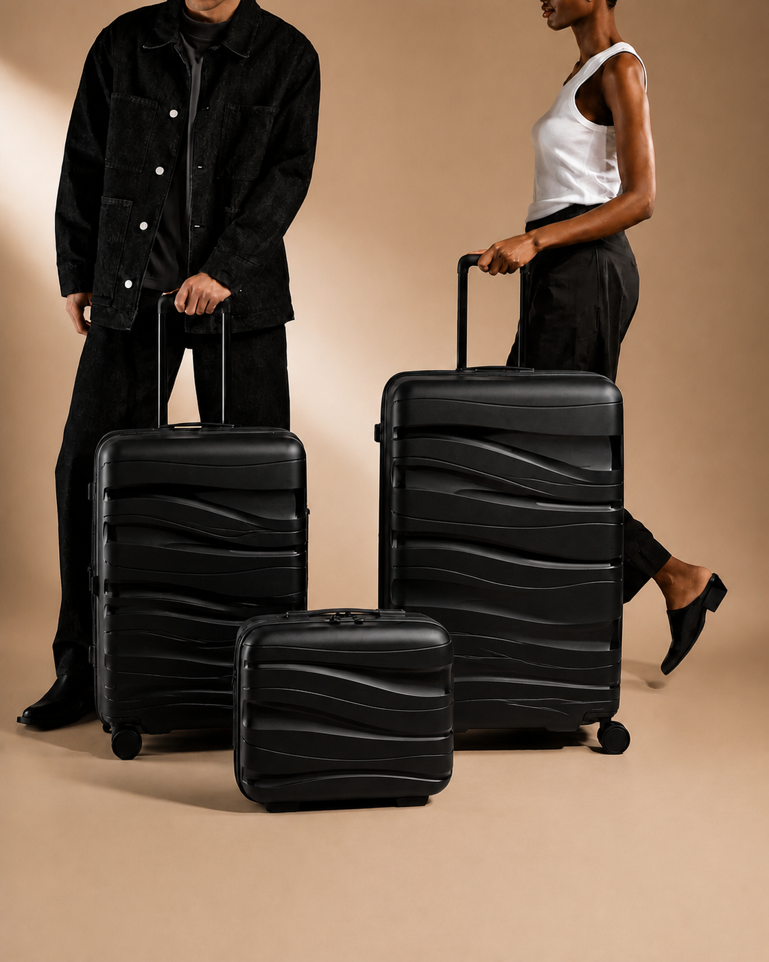 Manorbier 3 Piece Hard Shell Suitcase Set in Black, 14/20/28 Inch - lifestyle view
