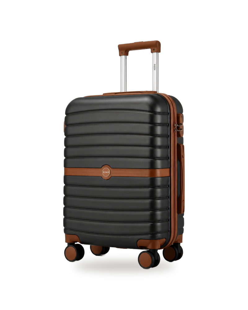Black hard shell cabin suitcase with tan leather trim on white background