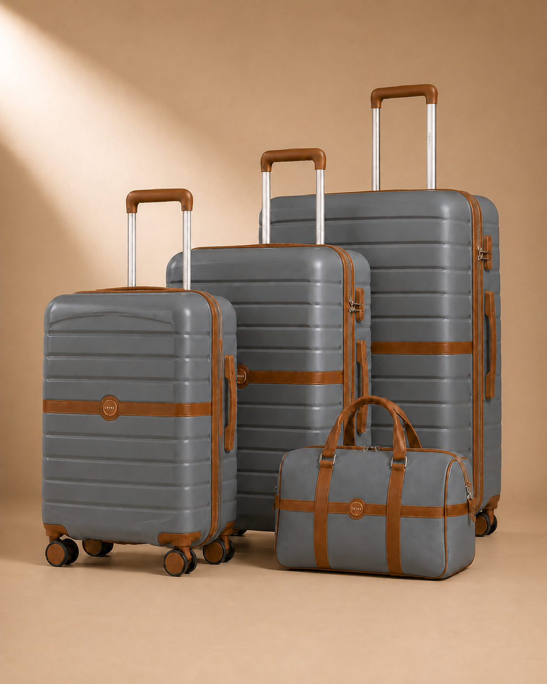 Grey Crail 3 Piece Hard Shell Suitcase Set with Travel Bag - clean studio product photo