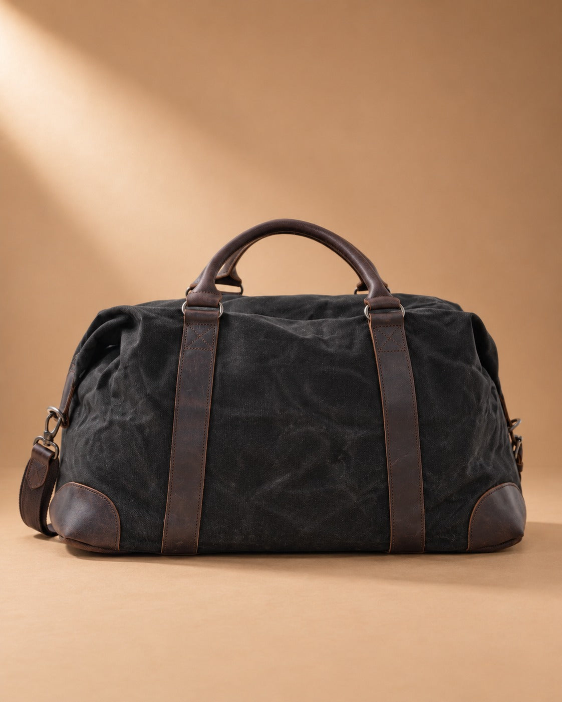 Airton Waxed Canvas Barrel Duffle Bag - black