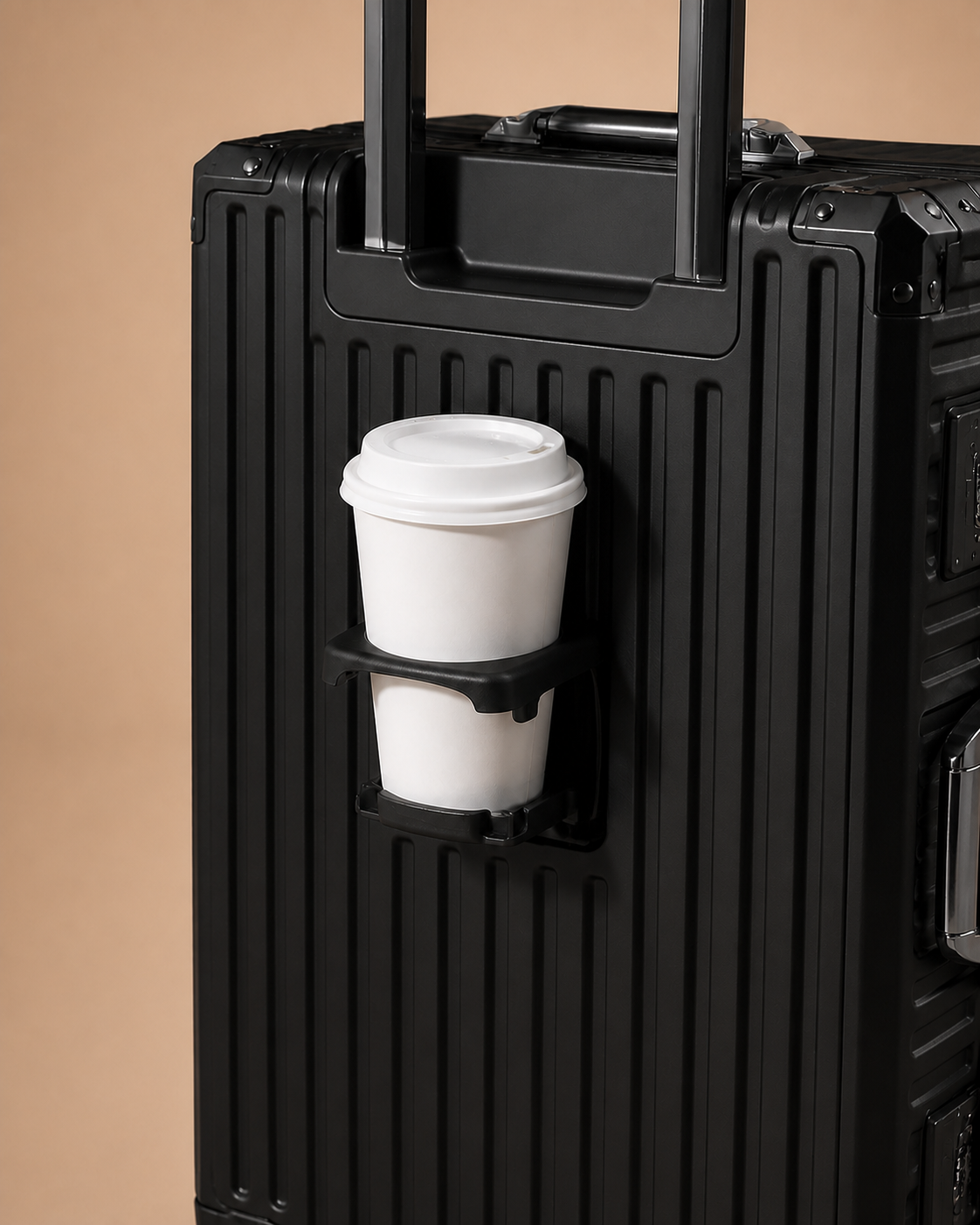Black ribbed cabin suitcase with built-in cup holder detail
