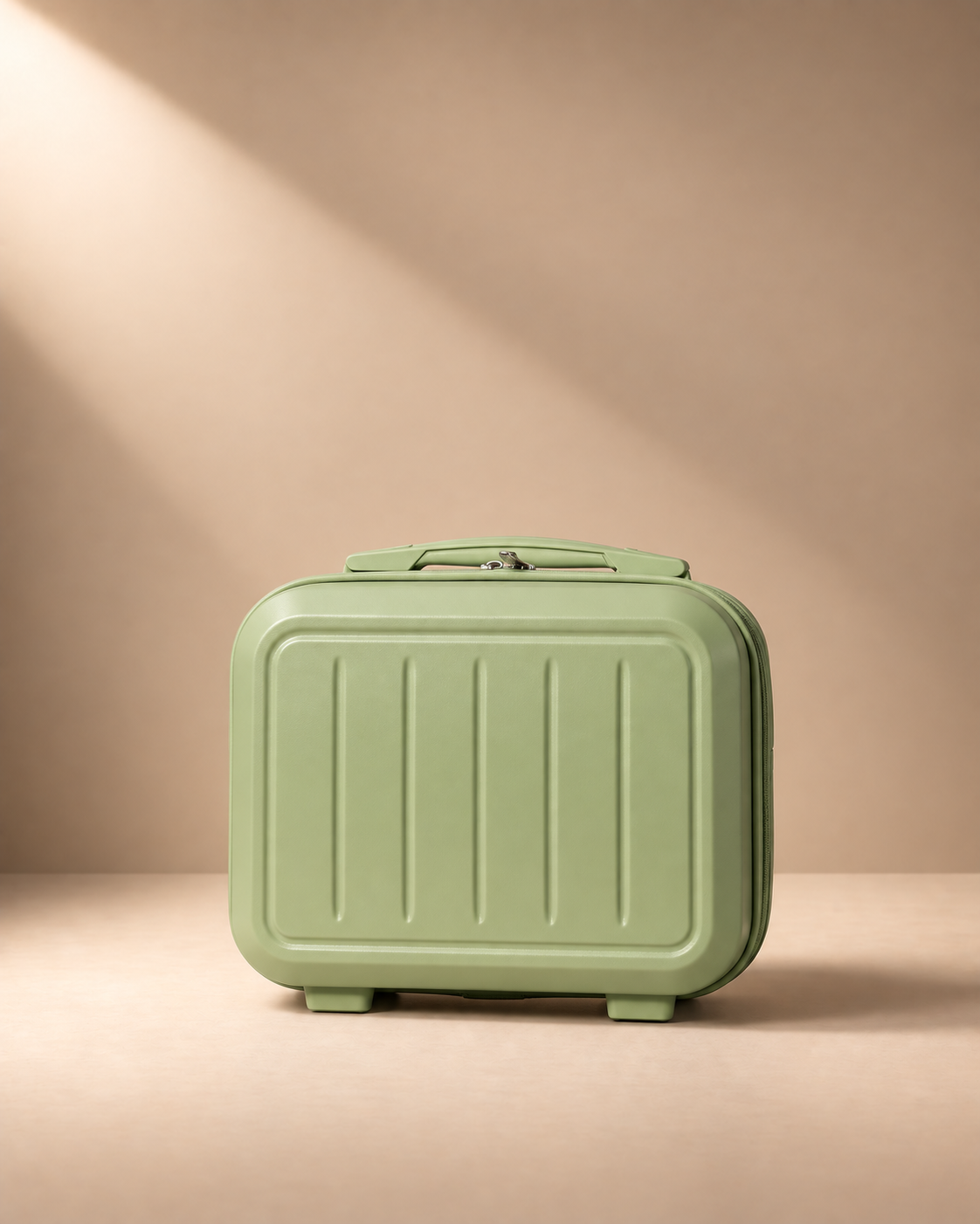 Sage green Mawgan 14 inch hard shell travel makeup case front view with ribbed shell, zip closure and top handle