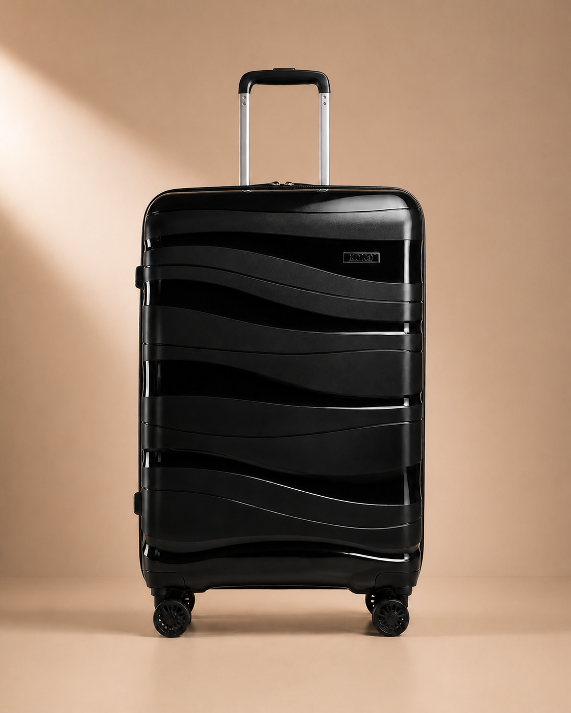 Black hard shell travel makeup case close front studio view