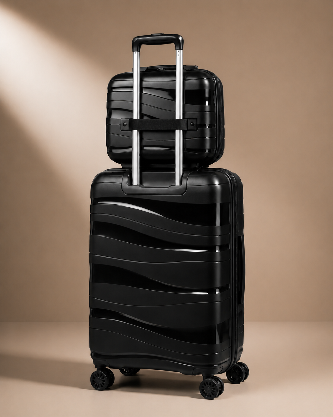 Black hard shell travel makeup case rear view with trolley handle